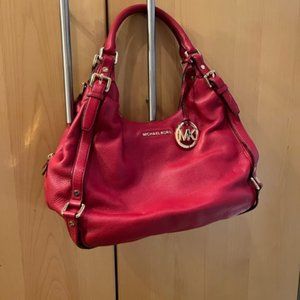 Original Michael Kors red leather bag practically brand new